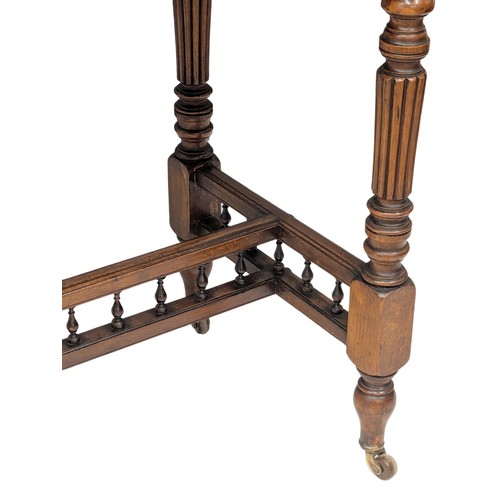 833 - A 19th Century Victorian walnut turnover games table. Circa 1880. 91.5x45x75cm