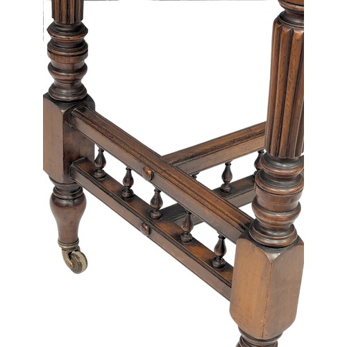 833 - A 19th Century Victorian walnut turnover games table. Circa 1880. 91.5x45x75cm