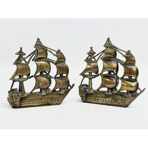 722 - A collection of 19th and Early 20th Century brass and copper. A pair of Victorian brass sailing ship... 