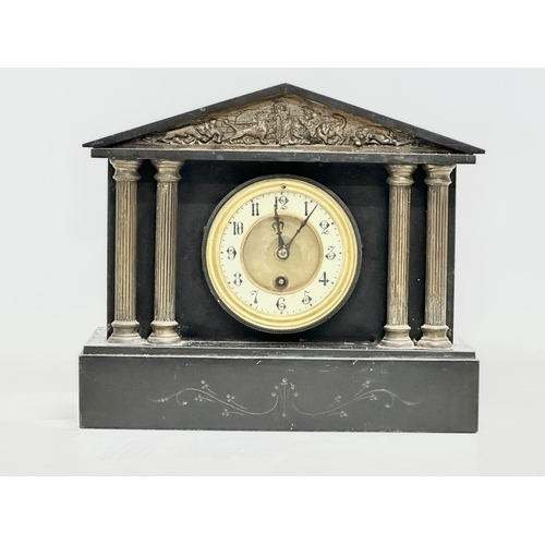 725 - A Late 19th Century Victorian slate mantle clock.