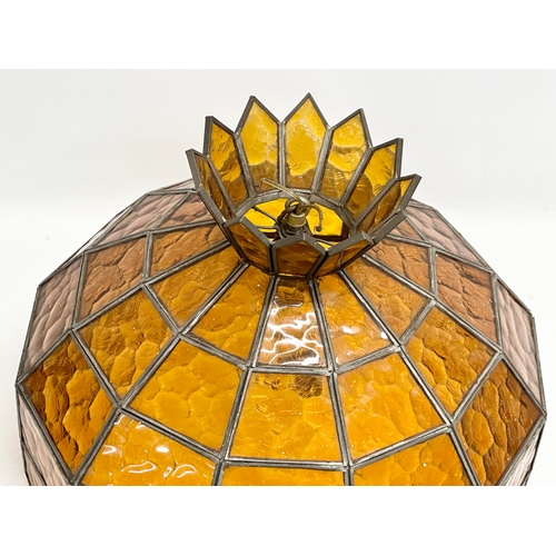 727 - A large Mid 20th Century stained glass light shade. 39x29.5cm