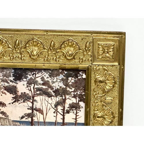 733 - An Early 20th Century brass framed print. 58x47cm