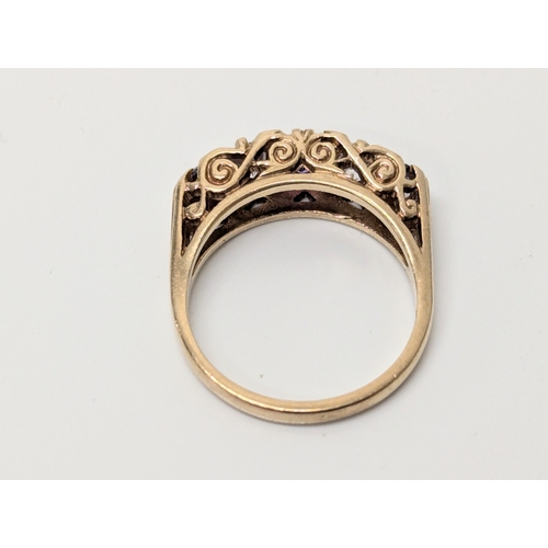 673 - 9ct gold ring. UK size N. 3.5 grams.