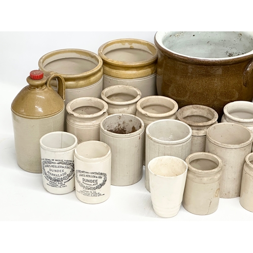 735 - A collection of Early 20th Century stone jars and flagons etc