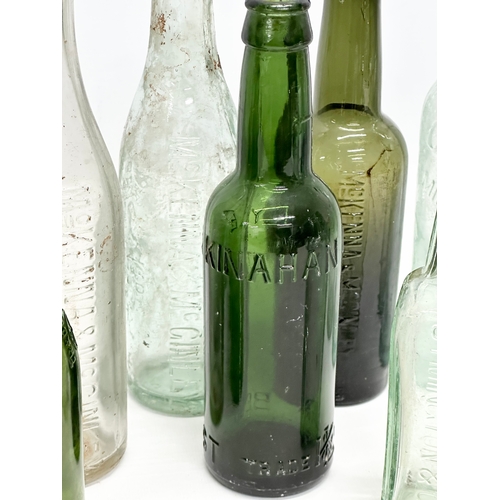 737 - A collection of Irish glass bottles. Clonard, Lyle & Kinahan, Ross’s, Young’s, McKenna & McGinley et... 