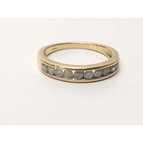 676 - 9ct gold & diamond ring. UK size Q. 2.8 grams