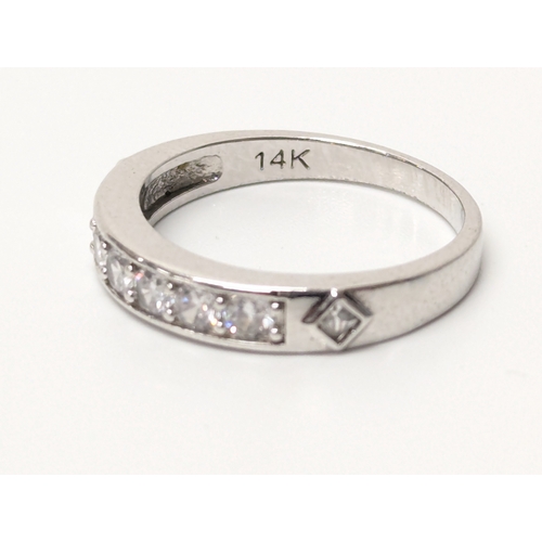 679 - 14ct white gold ring. UK size P. 2.6 grams