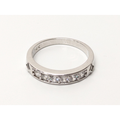 679 - 14ct white gold ring. UK size P. 2.6 grams