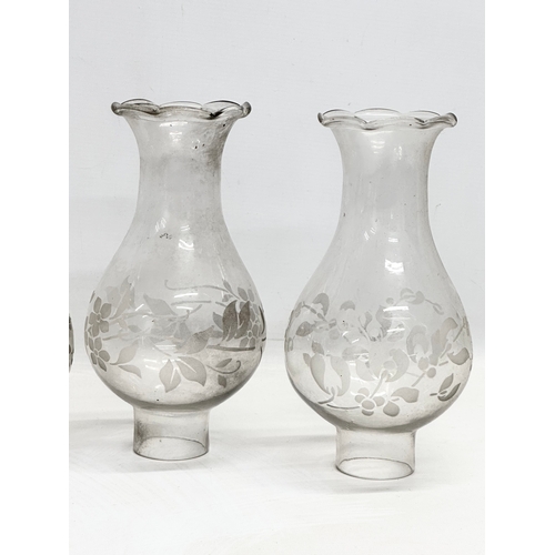 743 - A set of 4 Early 20th Century etched glass oil lamp funnels. 24cm