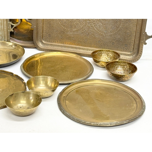 747 - A collection of 19th and Early 20th Century engraved brass trays and bowls.