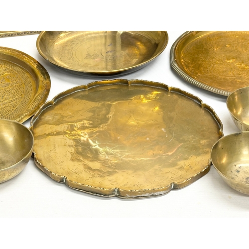 747 - A collection of 19th and Early 20th Century engraved brass trays and bowls.