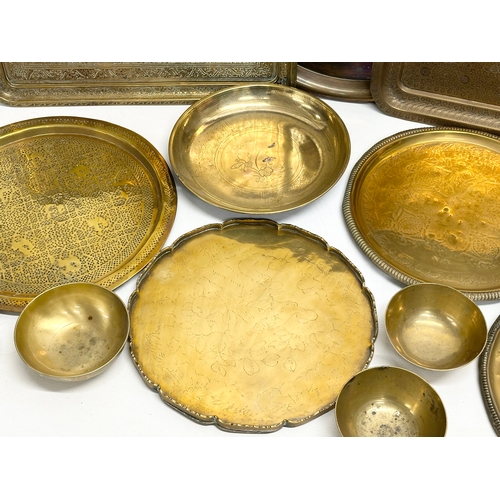 747 - A collection of 19th and Early 20th Century engraved brass trays and bowls.