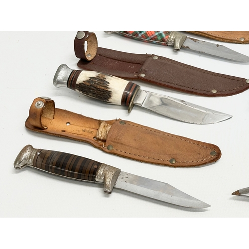 749 - A collection of vintage knives and penknives.