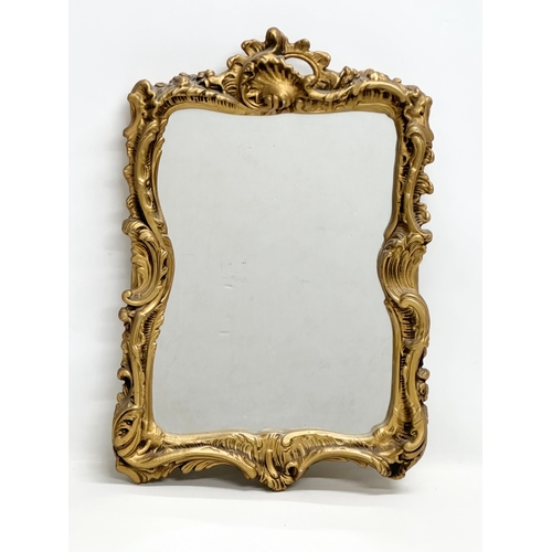 914 - Two Mid 20th Century gilt framed mirrors.