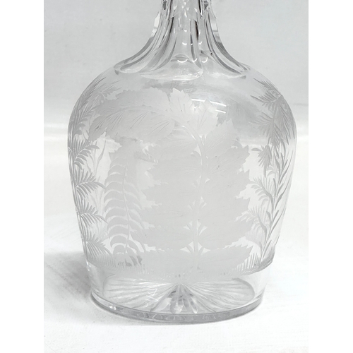 493 - A 19th Century Victorian etched glass decanter. 25cm