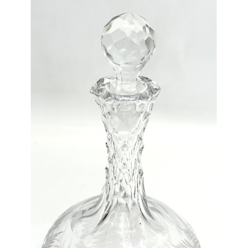 493 - A 19th Century Victorian etched glass decanter. 25cm