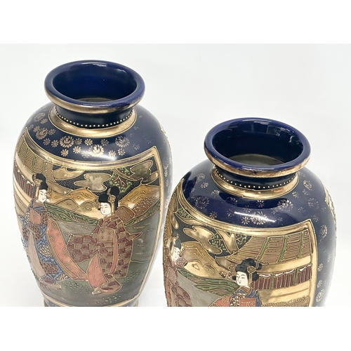 923 - A pair of large Japanese Satsuma banister vases. 18x32cm