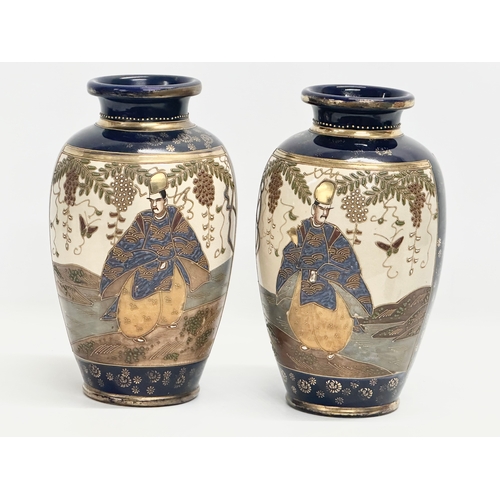 923 - A pair of large Japanese Satsuma banister vases. 18x32cm