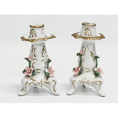 494 - A pair of Early 20th Century Dresden style flower encrusted porcelain candlesticks. Circa 1900-1920.... 