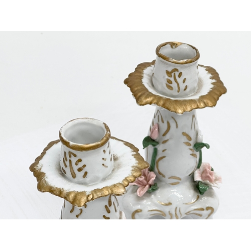 494 - A pair of Early 20th Century Dresden style flower encrusted porcelain candlesticks. Circa 1900-1920.... 