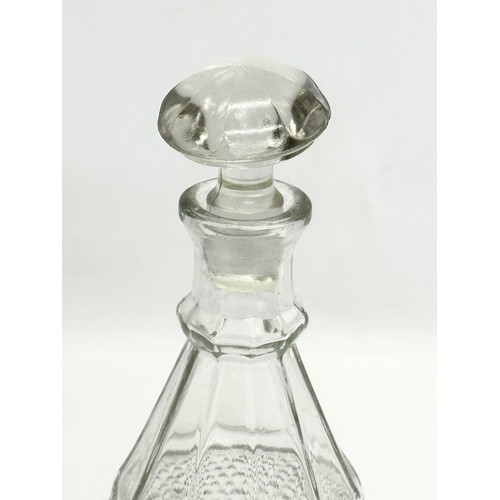 495 - A 1920’s Art Deco glass decanter. 26cm