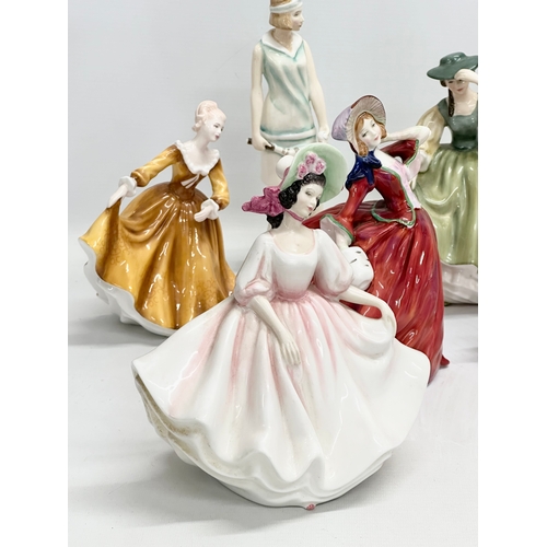 905 - A collection of Royal Doulton figurines. 28cm. 24cm. 22cm. 21cm. 11 figurines.