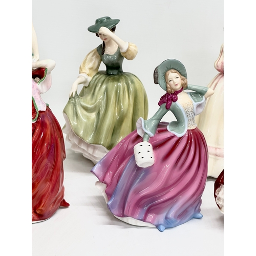 905 - A collection of Royal Doulton figurines. 28cm. 24cm. 22cm. 21cm. 11 figurines.