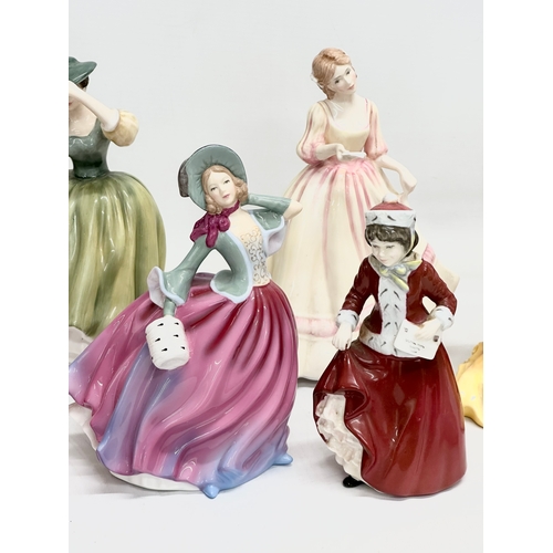 905 - A collection of Royal Doulton figurines. 28cm. 24cm. 22cm. 21cm. 11 figurines.