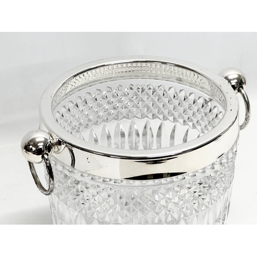 918 - A 20th Century silver mounted glass ice bucket. 25x19x21cm