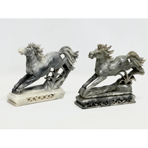 937 - A pair of Chinese soapstone horses. 21x19cm