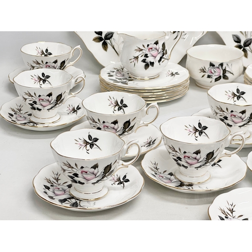 924 - Royal Albert Queens Messenger. A 40 piece bone china tea service.