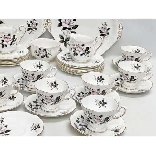 924 - Royal Albert Queens Messenger. A 40 piece bone china tea service.