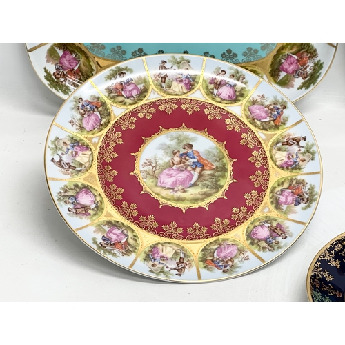 947 - A collection of Royal Vienna porcelain cabinet plates and trays. 35x25cm. 26cm. 24.5cm