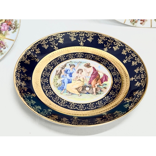 947 - A collection of Royal Vienna porcelain cabinet plates and trays. 35x25cm. 26cm. 24.5cm