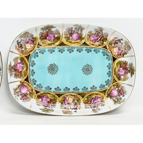 947 - A collection of Royal Vienna porcelain cabinet plates and trays. 35x25cm. 26cm. 24.5cm