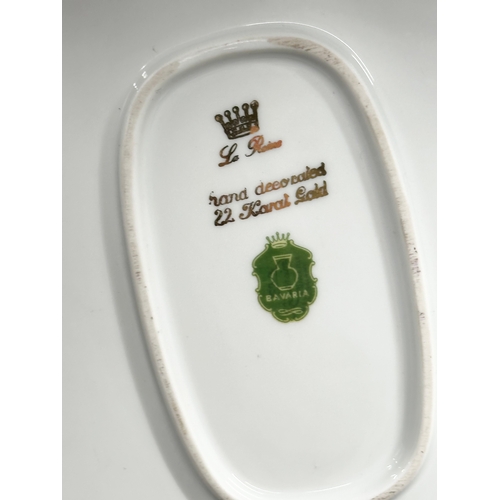 947 - A collection of Royal Vienna porcelain cabinet plates and trays. 35x25cm. 26cm. 24.5cm