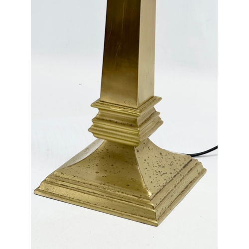 710 - A large good quality polished brass table lamp. 80cm