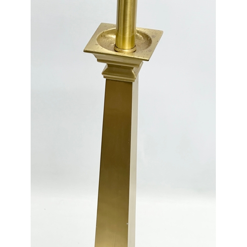 710 - A large good quality polished brass table lamp. 80cm