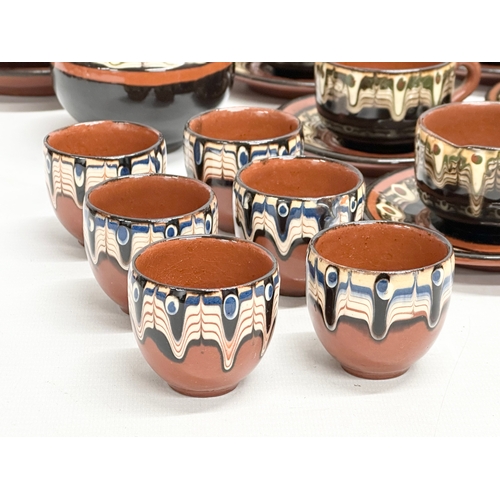 713 - A Mid 20th Century Bulgarian pottery glazed clay “Troyan” tea service. 29 piece.