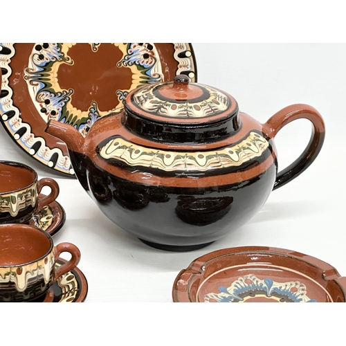 713 - A Mid 20th Century Bulgarian pottery glazed clay “Troyan” tea service. 29 piece.