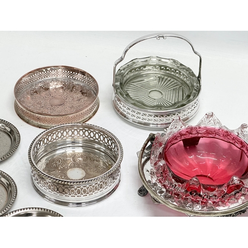 950B - A collection of Late 19th and 20th Century silver plate. A Victorian cranberry glass dish, coasters ... 