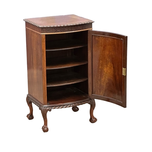 405 - A 1930’s Chippendale Revival mahogany bow front pedestal side cabinet. 52x43x94cm