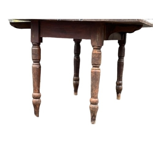 424 - A Victorian farmhouse kitchen drop leaf dining table. Open 108x122x76cm. Closed 68x122x76cm