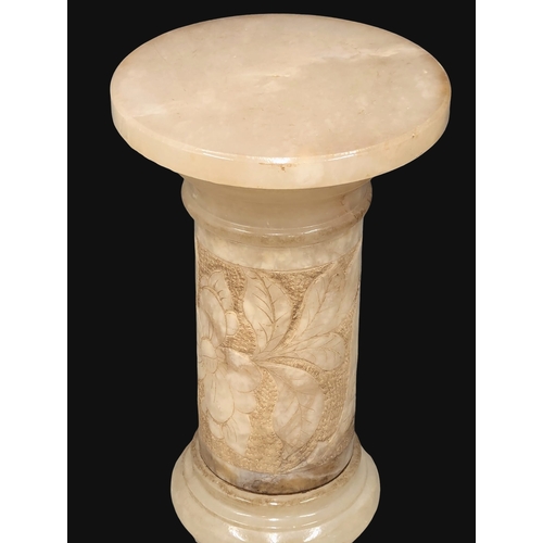 444 - A Mid 20th Century alabaster jardiniere stand. 81cm