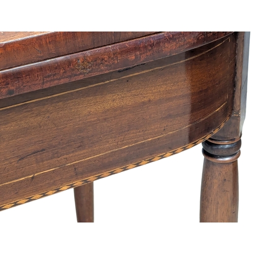 473 - An Early 19th Century George IV inlaid mahogany turnover tea table on turned legs. Circa 1820. 103x5... 