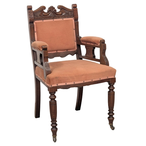 496 - A pair of Late 19th Century Victorian walnut armchairs. Circa 1880-1890.