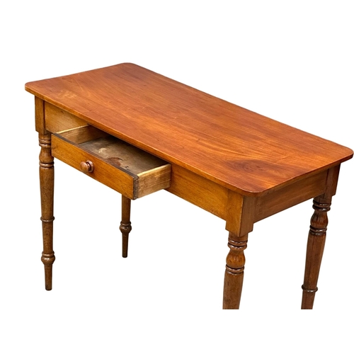 535 - A 19th Century Victorian side table with drawer. 102x47x78cm