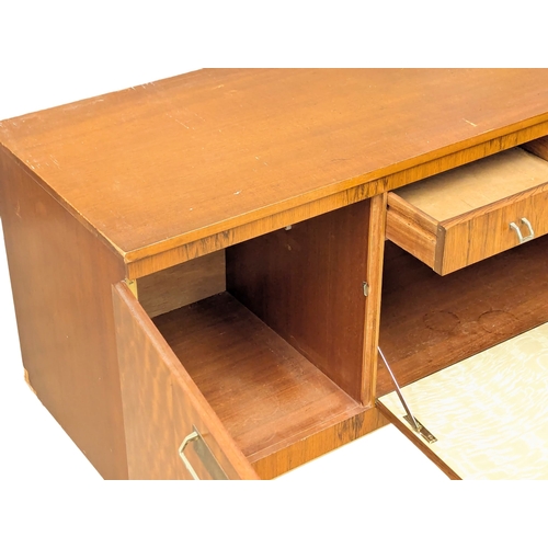 801 - A Mid Century sideboard by Stonehill. 151x43.5x77.5cm