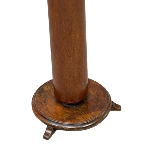 823 - A 19th Century Victorian mahogany torchere with later top and base. 126cm