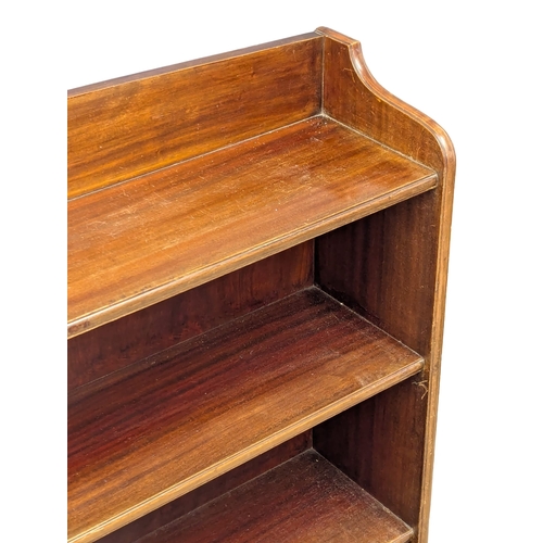 861 - A vintage mahogany open bookcase. 122x27x111cm. 1